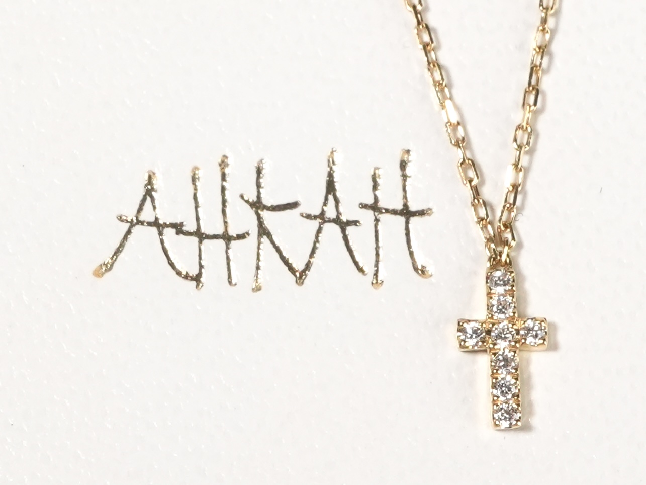 投稿記事「AHKAH アーカー クロス パヴェ ダイヤモンド ネックレス 750YGを買取しました！」の商品画像