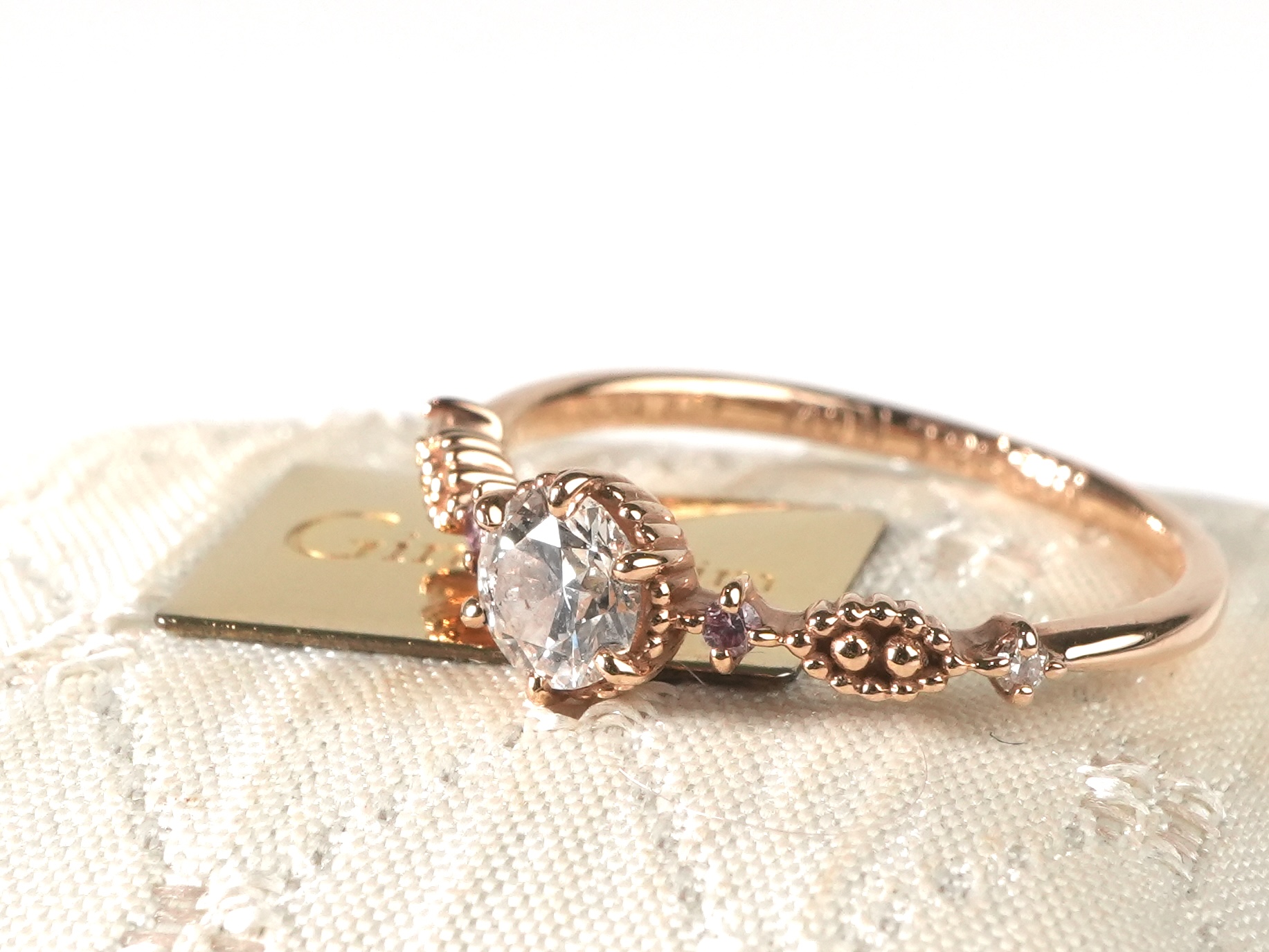 投稿記事「銀座リム ダイヤ ピンクダイヤ リング K18/1.64g 0.339ct 0.02ct 0.02ctを買取しました！」の商品画像