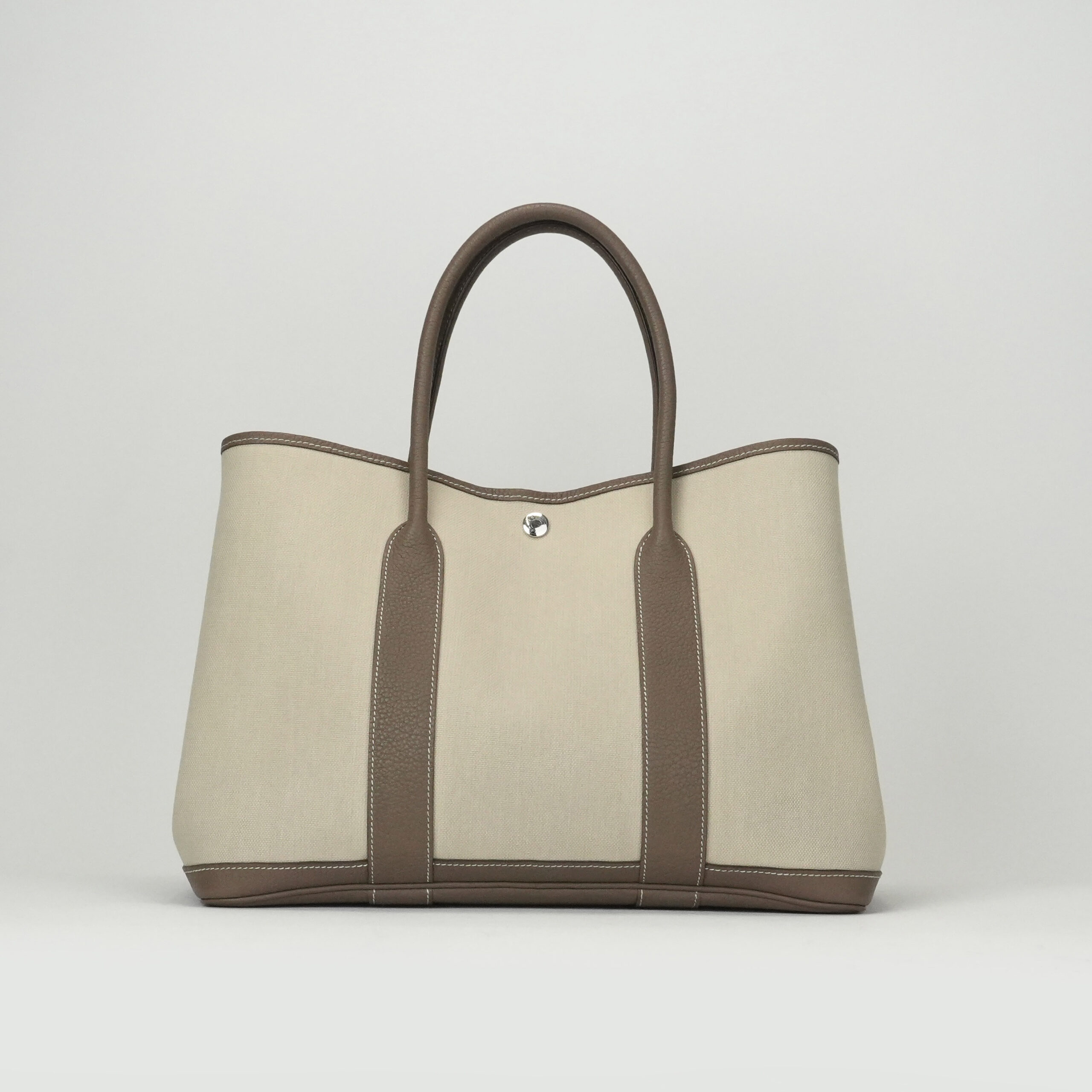 投稿記事「エルメス ガーデンパーティPM トワルミリタリー×ネゴンダ エトゥープ シルバー金具を買取しました！」の商品画像