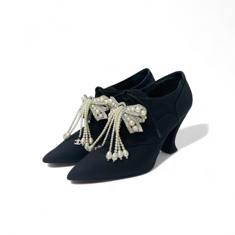 投稿記事「シャネル ファブリック ココマーク パール ビジュー リボン ブーティ ブラックを買取しました！」の商品画像